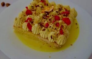 Thandai Tiramisu Cake Order Online Bangalore. Holi Special Cake Online Delivery Bangalore Cafe Hops.